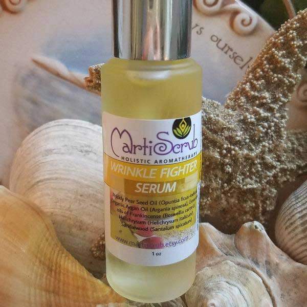 Bottle of MartiScrub Wrinkle Fighter Serum featuring nourishing prickly pear and argan oil for mature skin.
