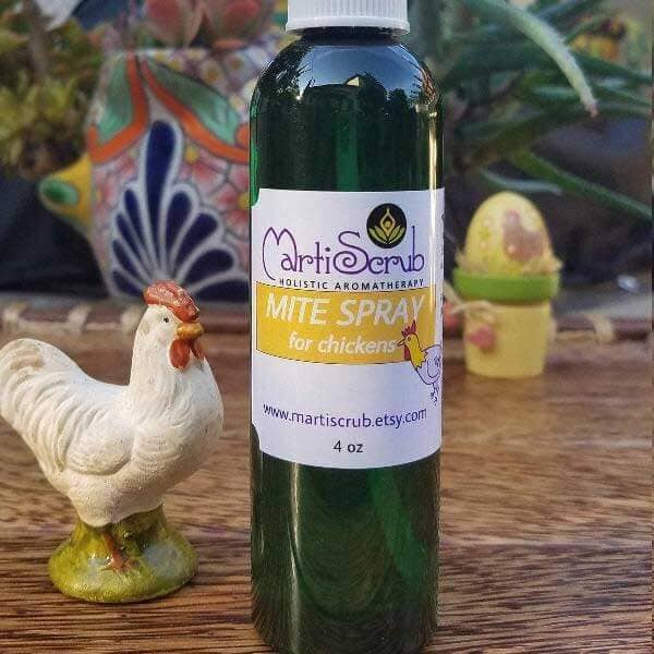 Chicken Mite Spray bottle for treating chicken legs, displayed alongside a decorative chicken figurine.